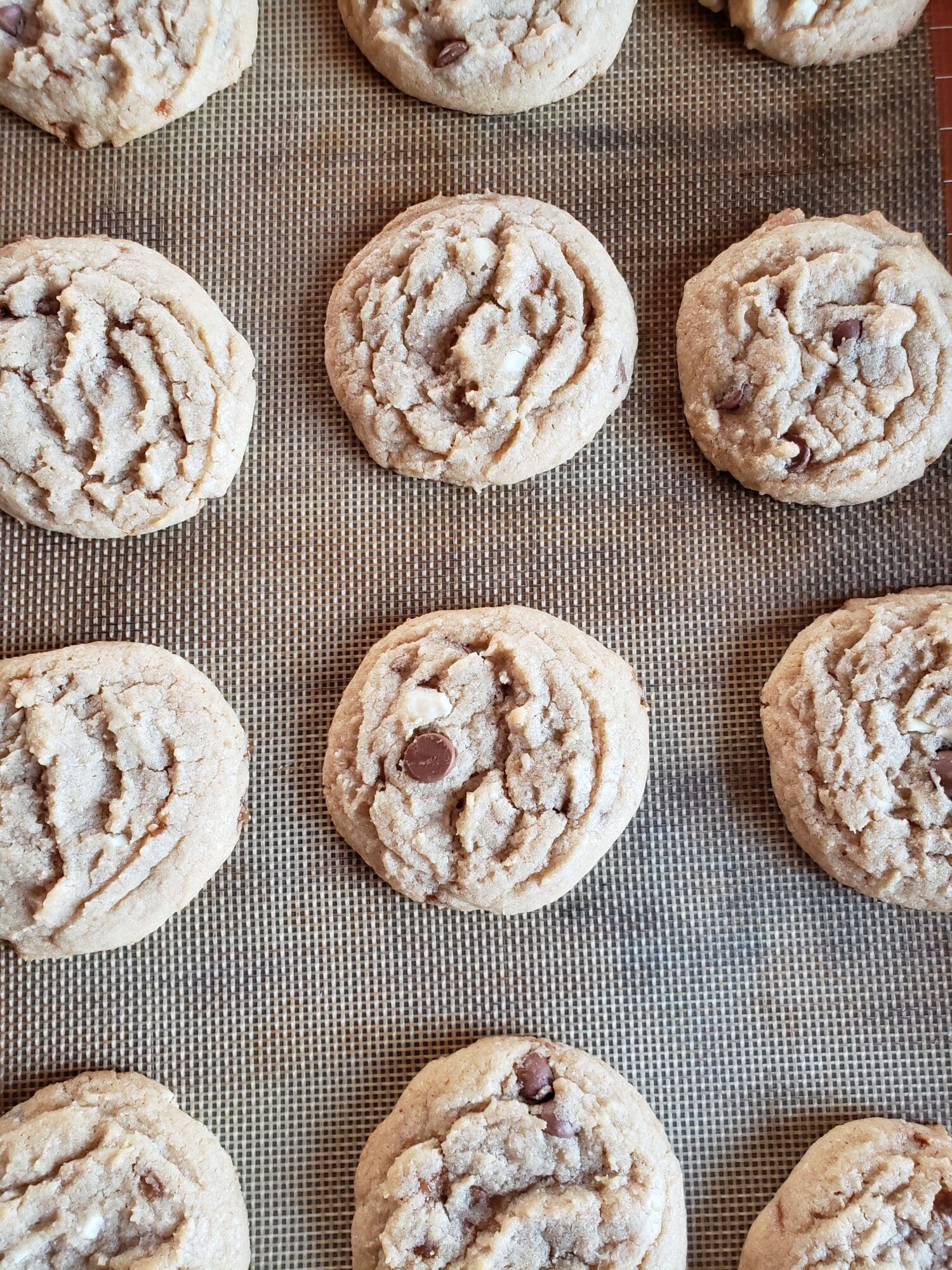 A close up of cookies on a baking sheet