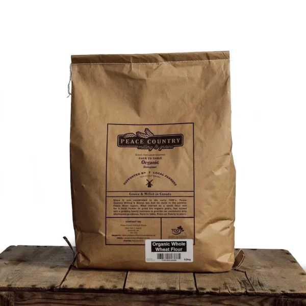 A brown bag sitting on top of a wooden table.